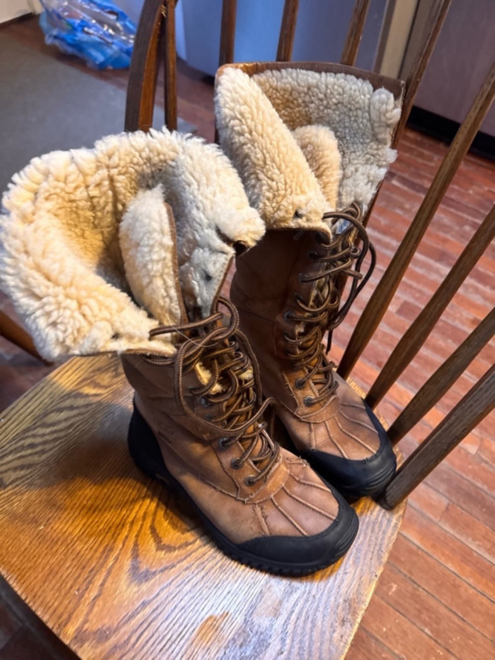 UGG lace-up winter boots with plush shearling lining UGG Adirondack Tall Leather
